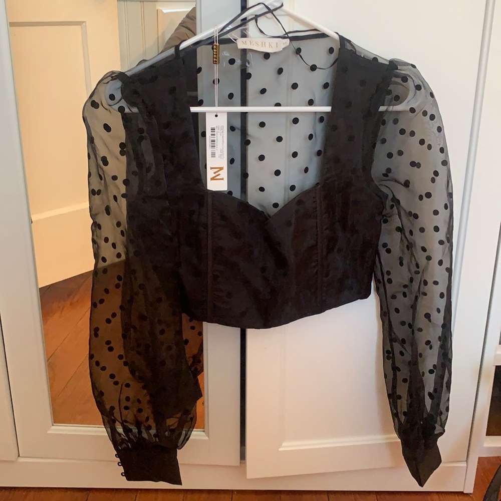 Meshki black too, size small. Never worn.